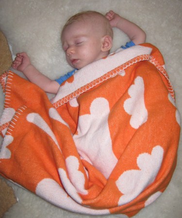 When Stina was just a couple of months fast asleep under her blanket