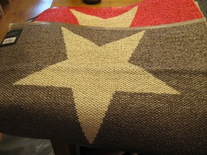 Pappelina plastic doormats with a large star