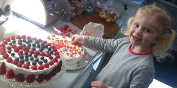 Stina is decorating the cakes