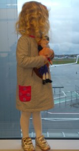 Checking out the airplanes while waiting to board out flight to Sweden.